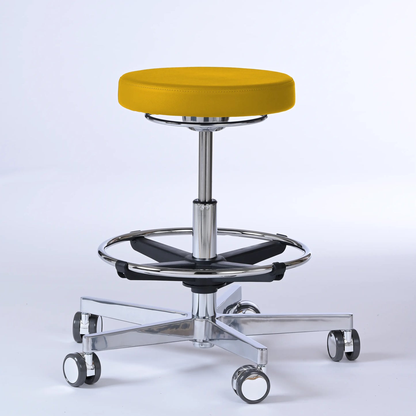 Drehhocker Lantinus – Gestell chrom mit Rollen – ergonomischer Praxishocker - gelb (4924) / Große Sitzfläche / Mit Fußstütze - Lacontaire
